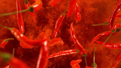 Dried chilli peppers explosion. Slow Motion. Stock Footage 250450534