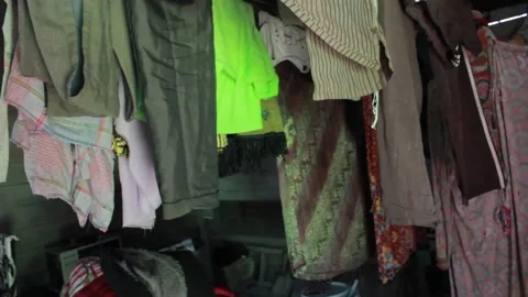 Dried clothes at home Stock Footage 197642429