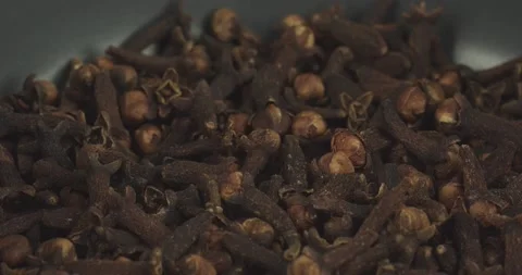 Dried cloves closeup rotating selective focus Stock Footage 156885556