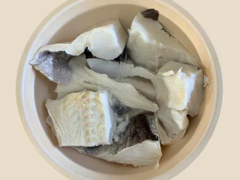 Dried Cod Fish Soaking in Water Stock Photos