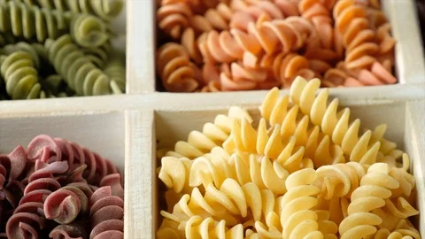 Dried colored fusilli pasta Stock-Footage 92604110