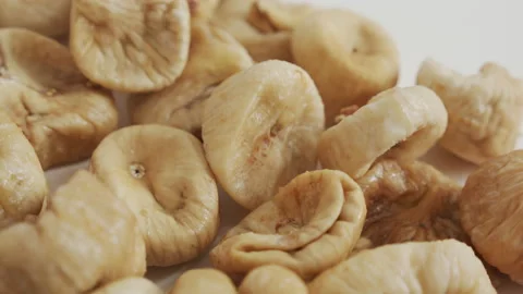 Dried common fig fruit on white 4K close-up video Stock Footage 149157445