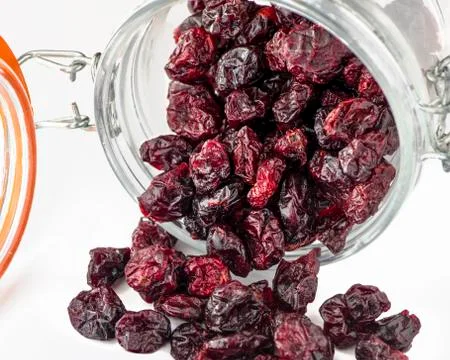 Dried cranberries in a jar Stock Photos