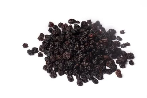 Dried currants on the white background Stock Photos