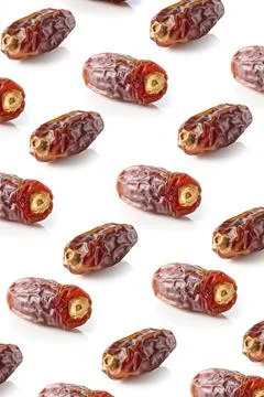 Dried date pattern isolated on white, from above Stock Photos