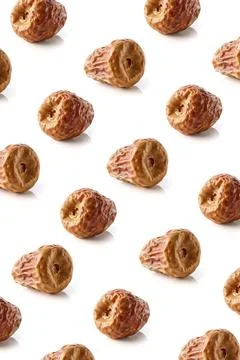 Dried date pattern isolated on white, from above Stock Photos