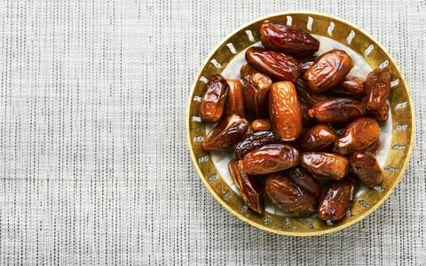 Dried date on table Stock Photos