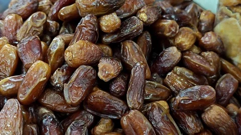 Dried dates are a type of fruit that originates from the Middle East. Stock Footage 304583710