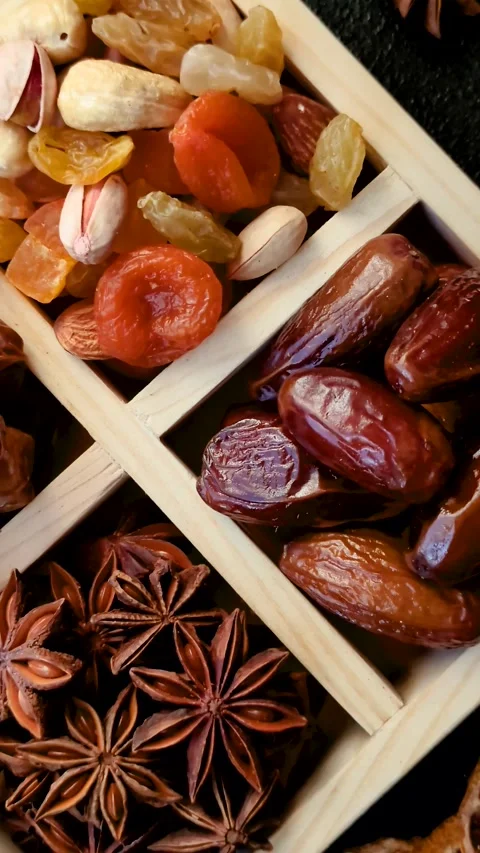 Dried dates on a ceramic plate for Ramadan or Iftar. Dates fruit as a background Stock Footage 331163211