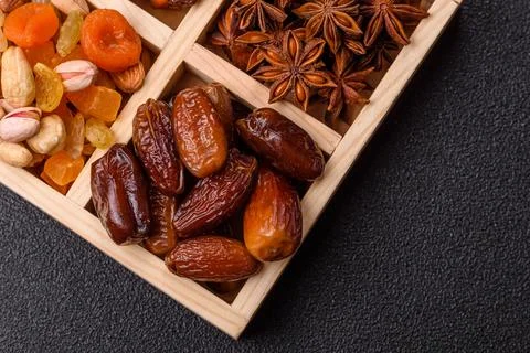 Dried dates on a ceramic plate for Ramadan or Iftar. Dates fruit as a backg.. Stock Photos