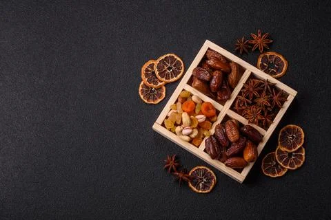 Dried dates on a ceramic plate for Ramadan or Iftar. Dates fruit as a backg.. Stock Photos