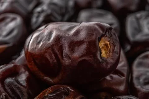 Dried dates close-up. Macro shot of delicious dried date fruits. Foto stock