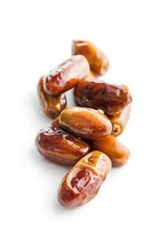 Dried dates fruit isolated on white background. Stock Photos