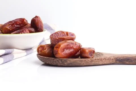 Dried dates fruit on white background Stock Photos