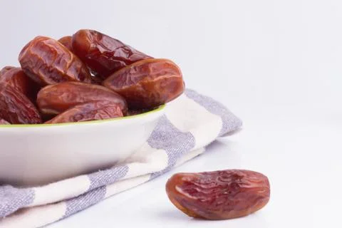 Dried dates fruit on white background Stock Photos
