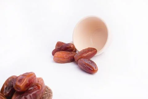 Dried dates fruit on white background Stock Photos