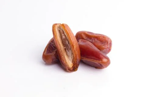Dried dates fruit on white background Stock Photos