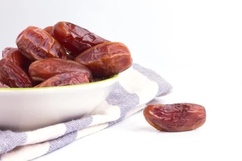 Dried dates fruit on white background Stock Photos