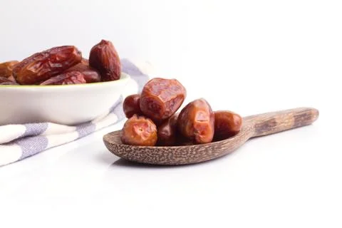 Dried dates fruit on white background Stock Photos