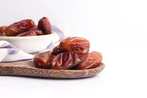 Dried dates fruit on white background Stock Photos