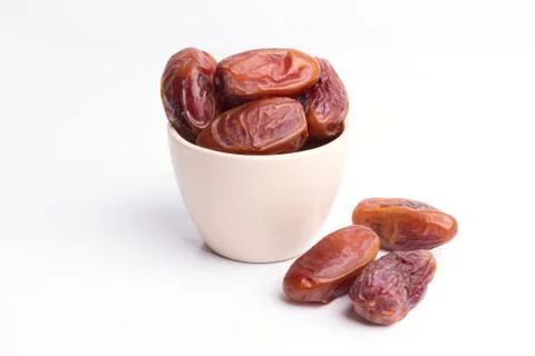 Dried dates fruit on white background Stock Photos