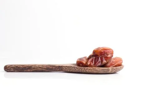 Dried dates fruit on white background Stock Photos