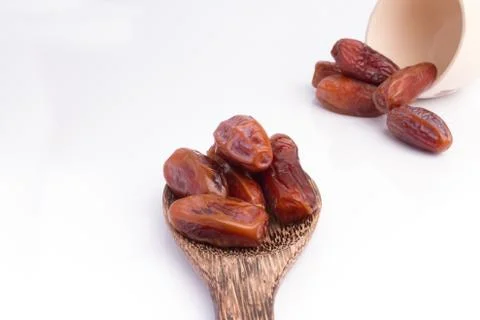 Dried dates fruit on white background Stock Photos