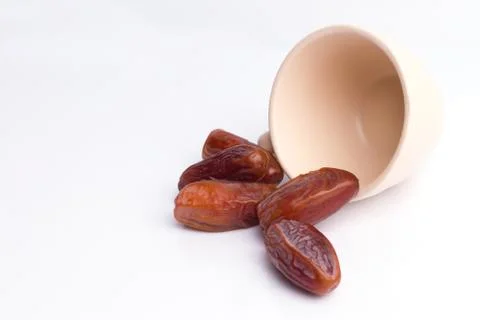 Dried dates fruit on white background Stock Photos