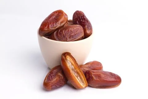 Dried dates fruit on white background Stock Photos