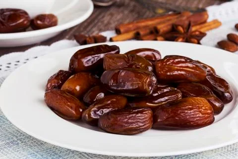 Dried dates in a plate Stock Photos