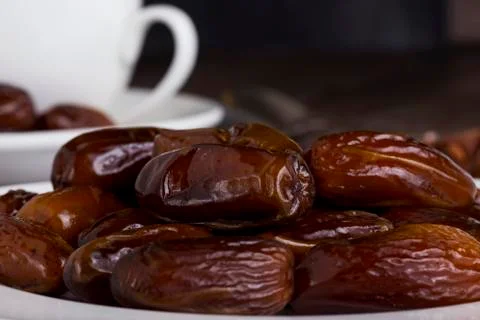 Dried dates in a plate Stock Photos