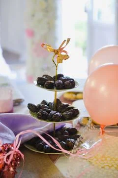 Dried dates on a plate Stock Photos