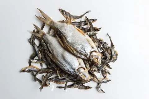 Dried dried fish on a gray background Stock Photos