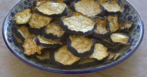 Dried eggplant slices. Table spin. Video stock 277935747