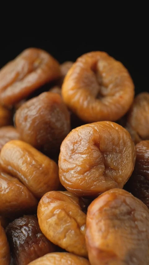Dried Fig Fruit Rotate Vertical on Black Background Stock Footage 328595401