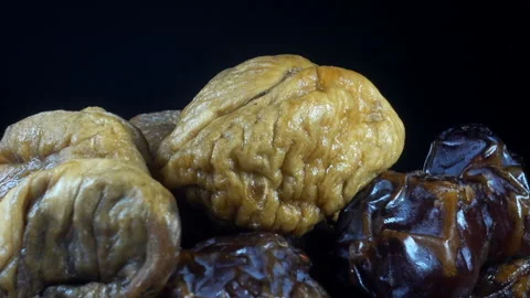 Dried figs and dates are spinning. Stock Footage 164213556