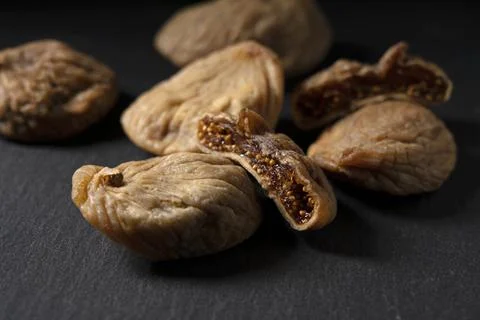 Dried figs on a black background Stock Photos