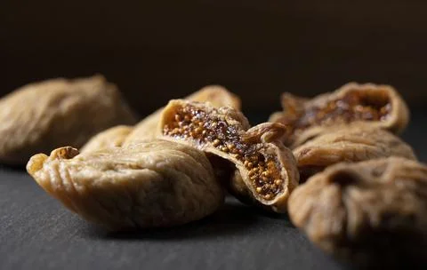 Dried figs on a black background Stock Photos