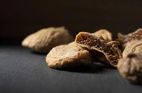 Dried figs on a black background Stock Photos