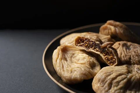 Dried figs on a black background Stock Photos