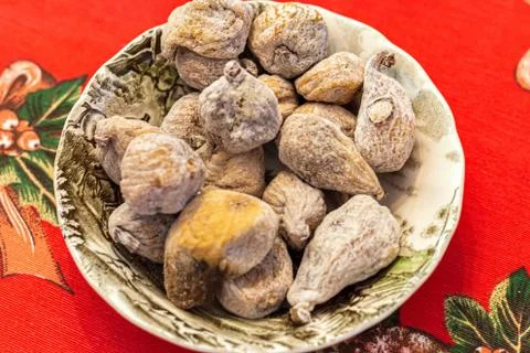 Dried figs in a bowl on a table Stock Photos