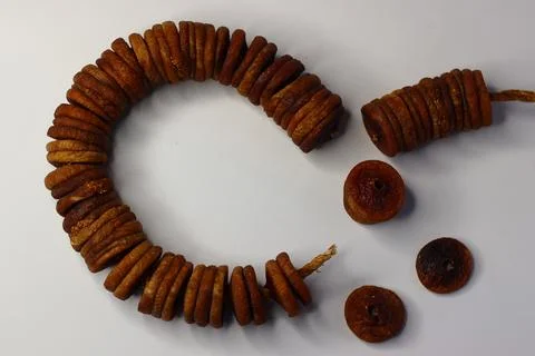 Dried figs on a string, showing rich texture and sweetness Stock Photos