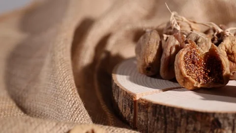 Dried figs on wood slider view, by01 Video stock 104662672