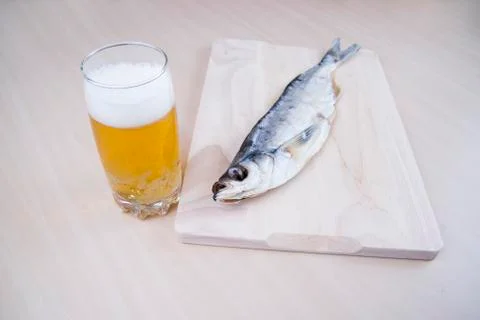 Dried fish with beer Stock Photos