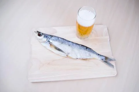 Dried fish with beer Foto stock