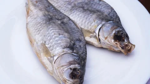 Dried fish. close-up of dried spinning fish Stock Footage 213808701