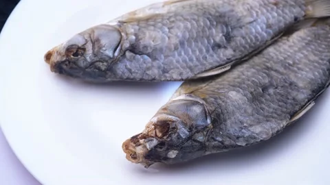 Dried fish. close-up of dried spinning fish Stock Footage 219746964