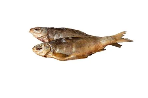 Dried fish isolated on white background. Beer snack. Roach. Selective focus.  Stock Photos