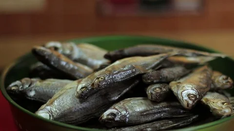Dried fish on a plate at the bar. Stock Footage 72928223