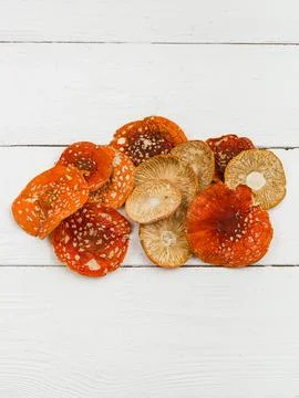 Dried fly agaric on a white background. Stock Photos